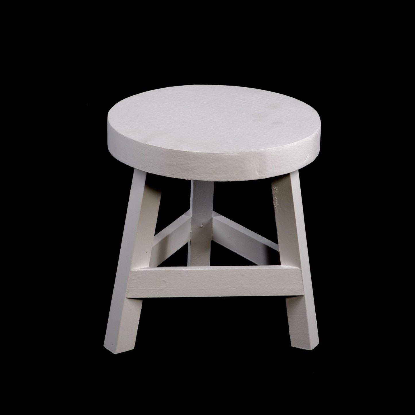 White Three Legged Stool Standing at 23 cm High